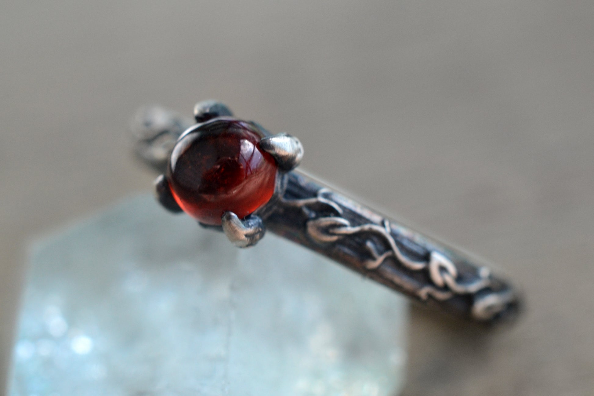 elven inspired garnet gemstone ring in silver