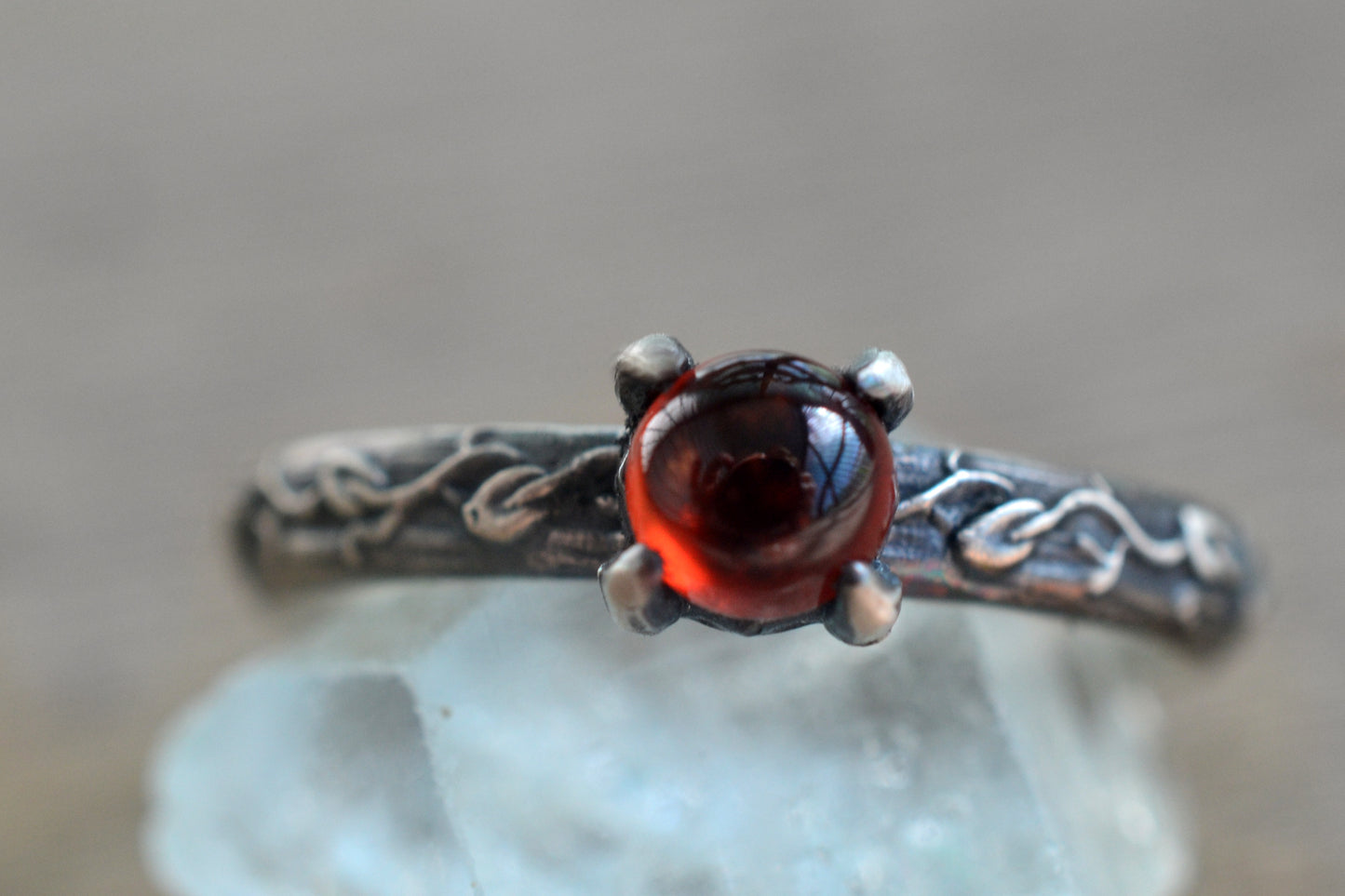 gothic vine leaf ring with natural garnet stone