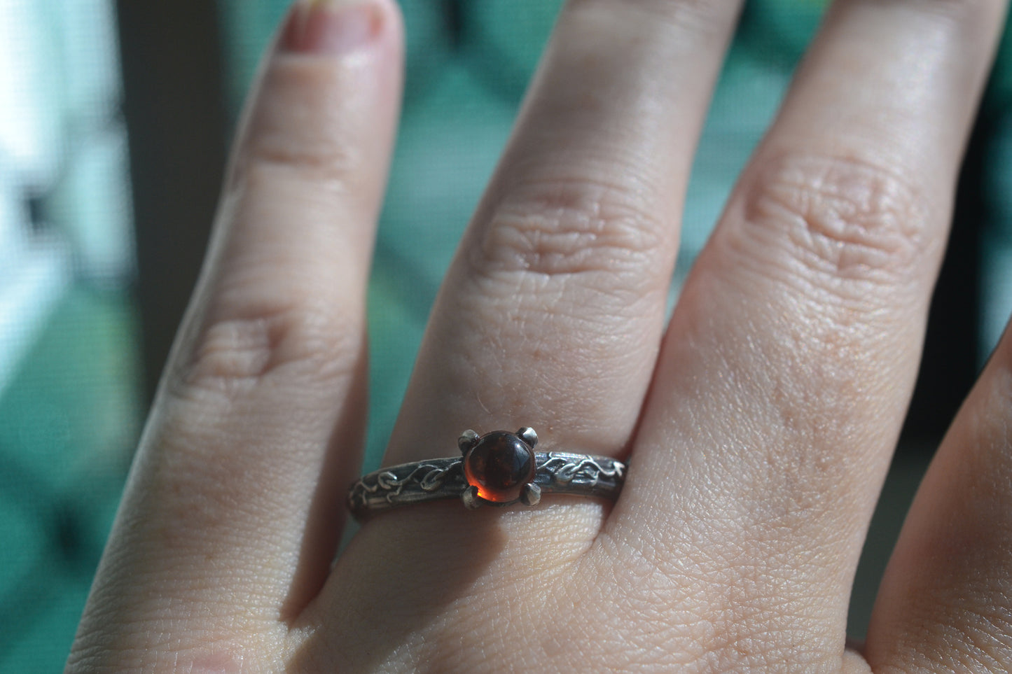 hessonite garnet vine leaf engagement ring