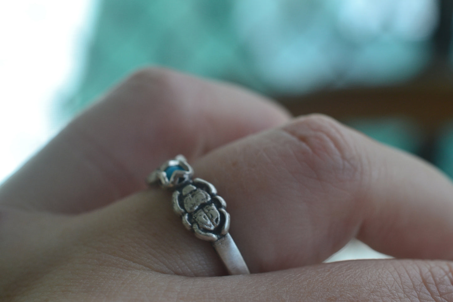 antiqued silver scarab ring with turquoise crystal