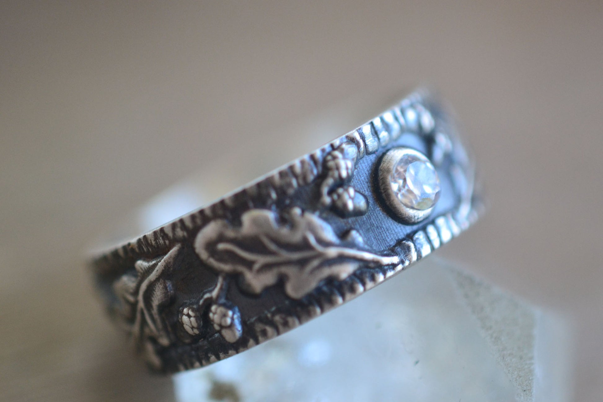 Acorn Wedding Band With Inset White Zircon