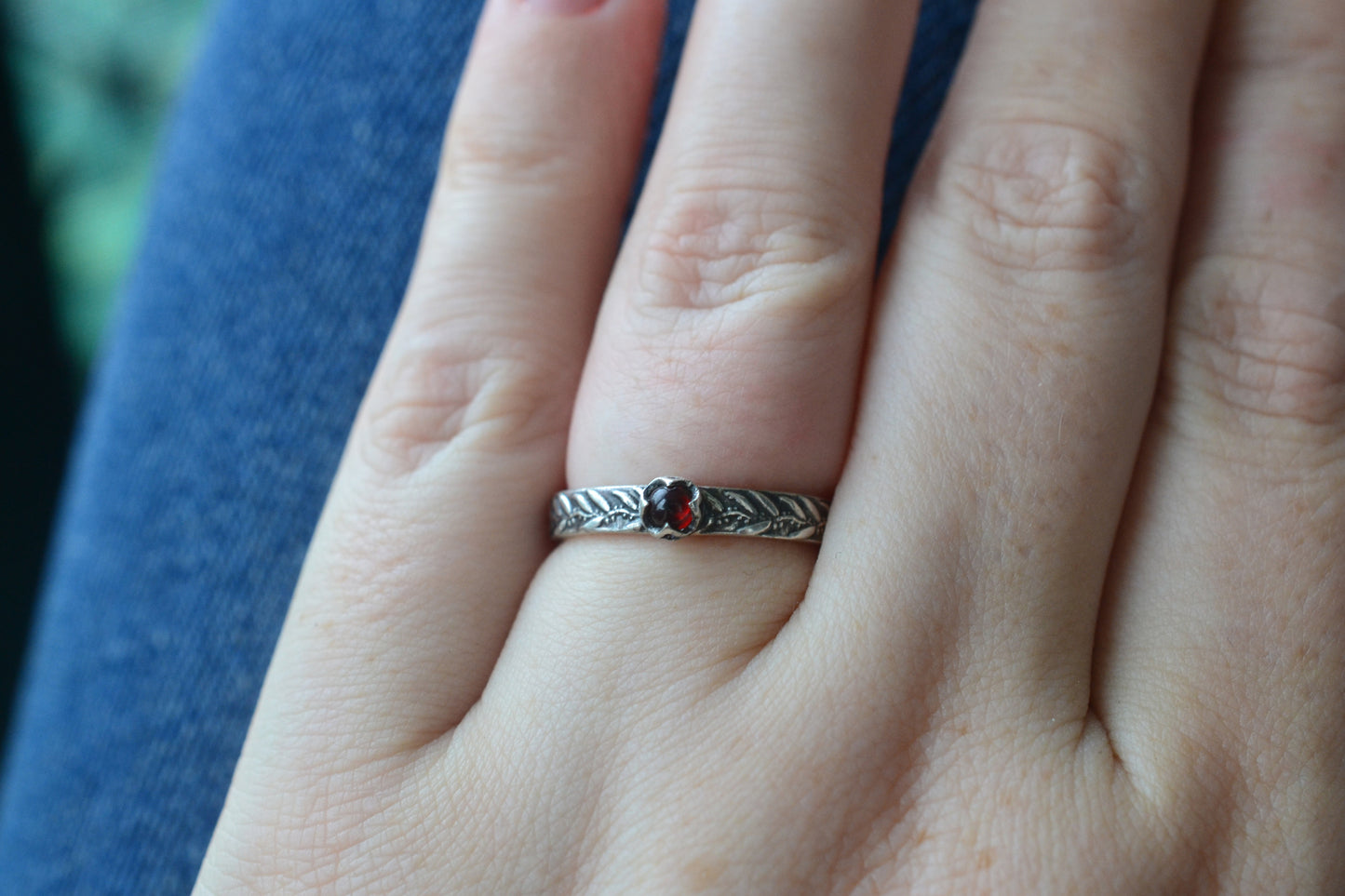 Tiny Garnet Ring With Silver Gum Leaf Pattern