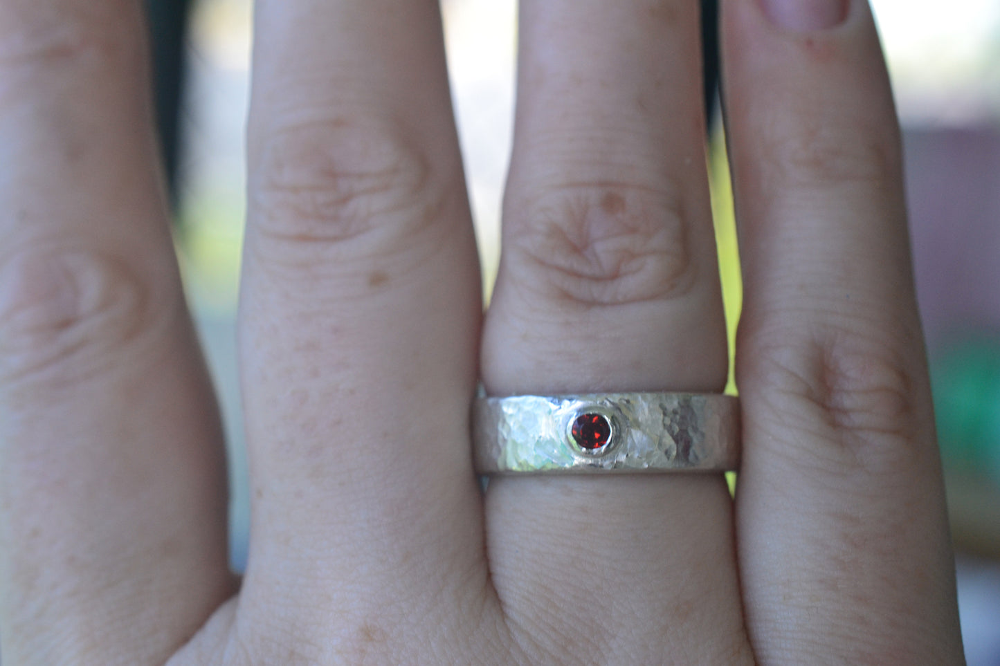 6mm Textured Silver Wedding Band With Faceted Garnet