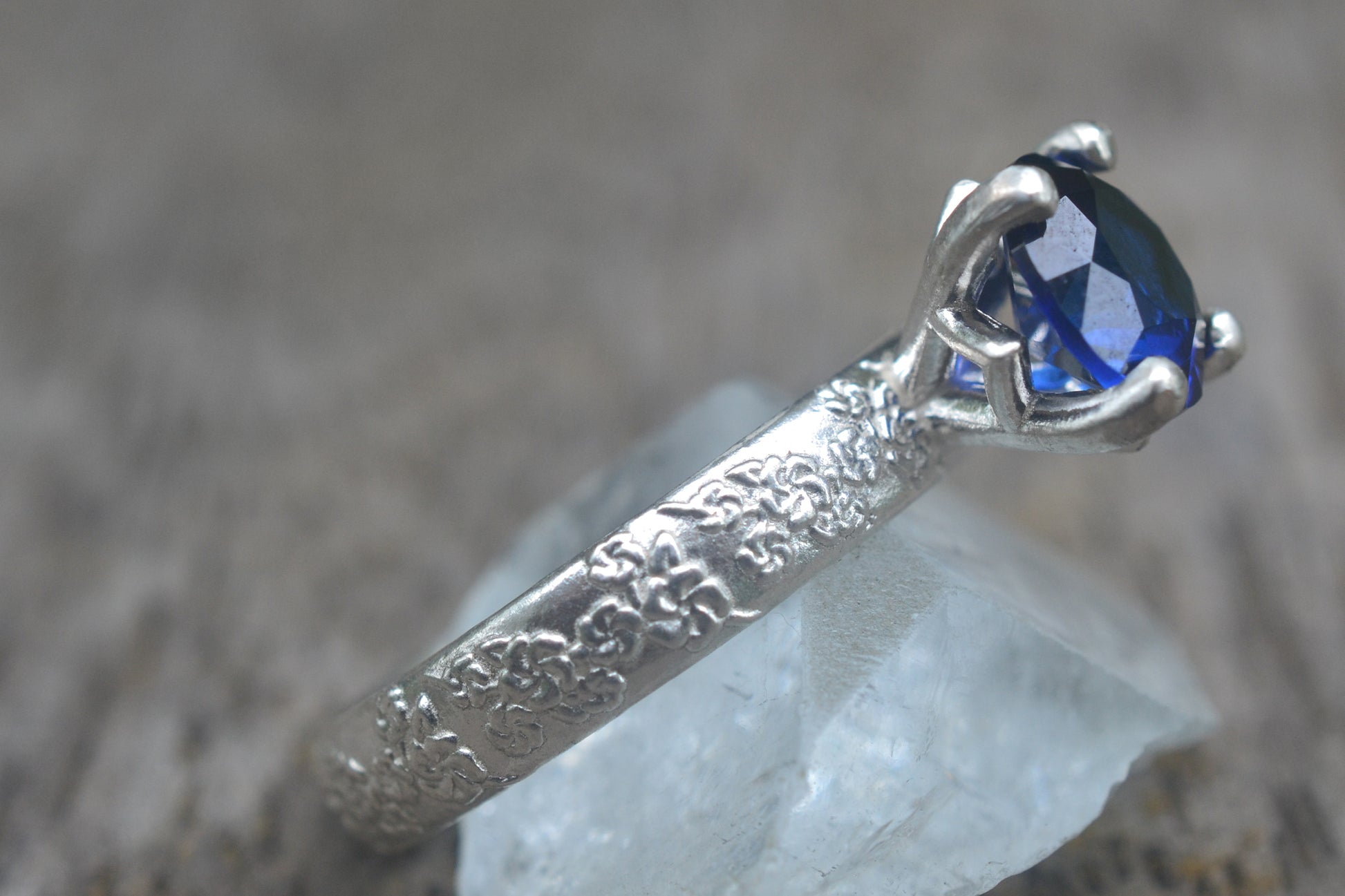 Claw Set Blue Sapphire Engagement Ring in Silver