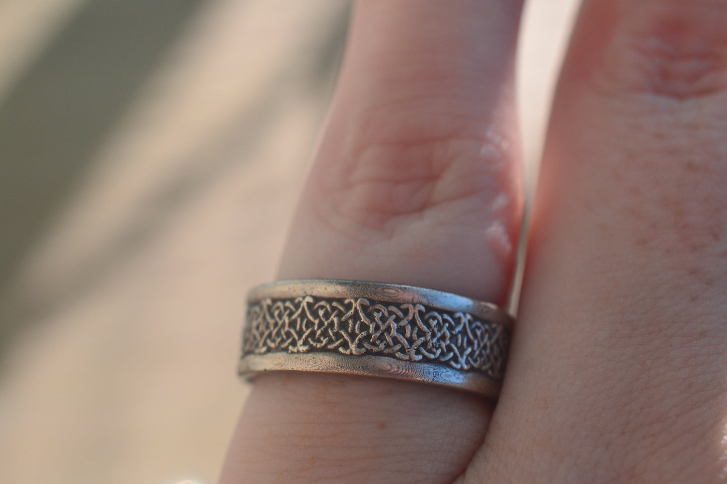 Wide Sterling Silver Wedding Band With Knot Design