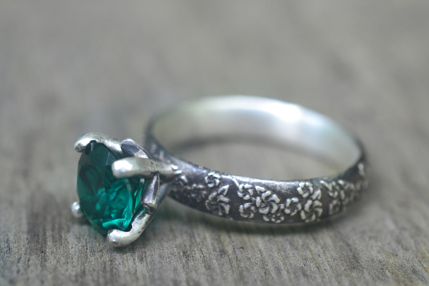 Oxidised Silver Blossom Ring With Emerald