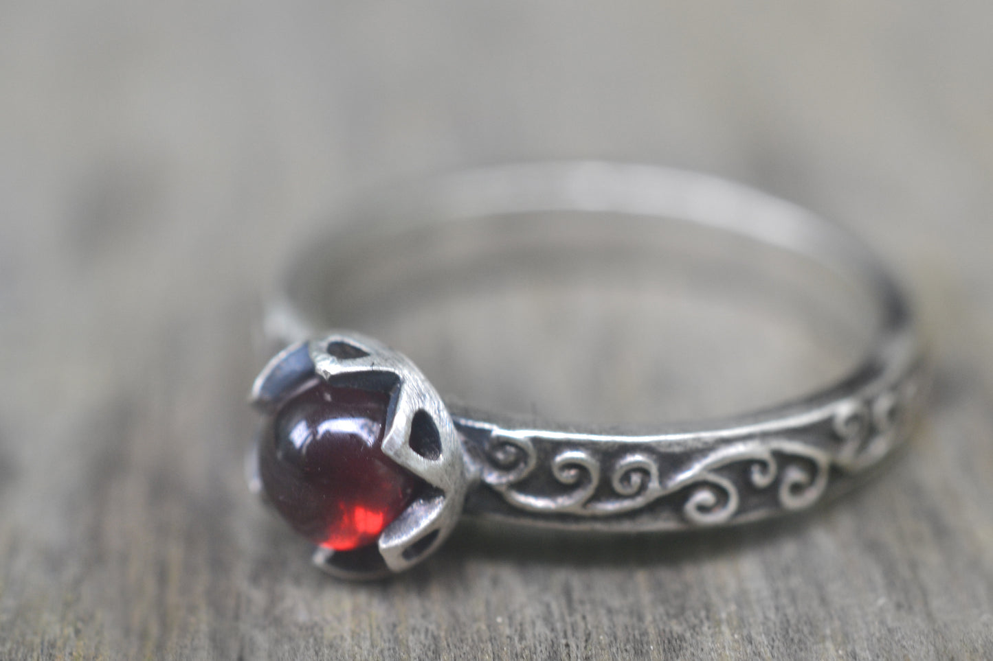 Gothic Garnet Swirl Ring in Oxidised Silver