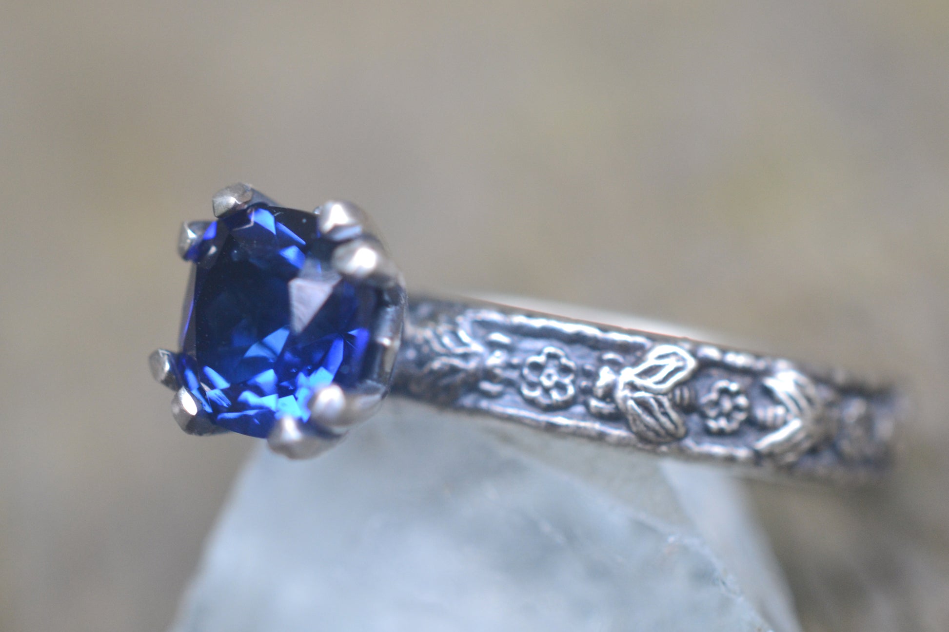 Cushion Cut Sapphire Ring with Rose and Bee Design