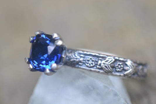 Cushion Cut Sapphire Ring with Rose and Bee Design