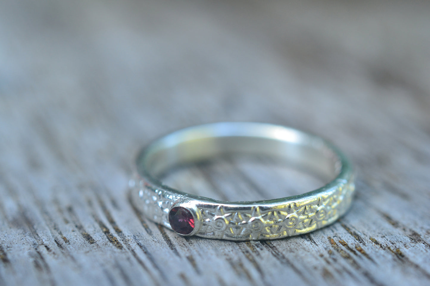 Silver Sun Ring With Inset 2.5mm Garnet Gem