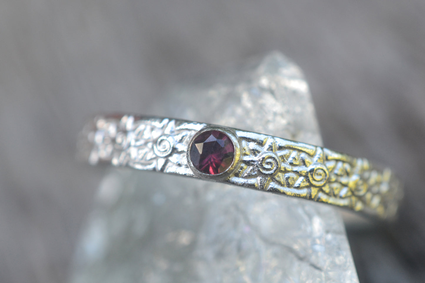 Silver Sun Wedding Band With Garnet