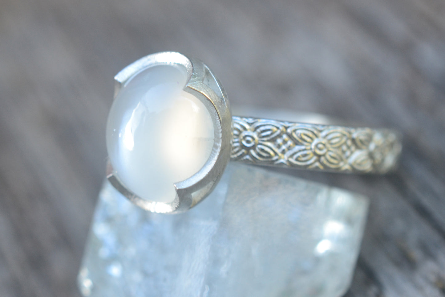 Oval White Moonstone Ring with Floral Design