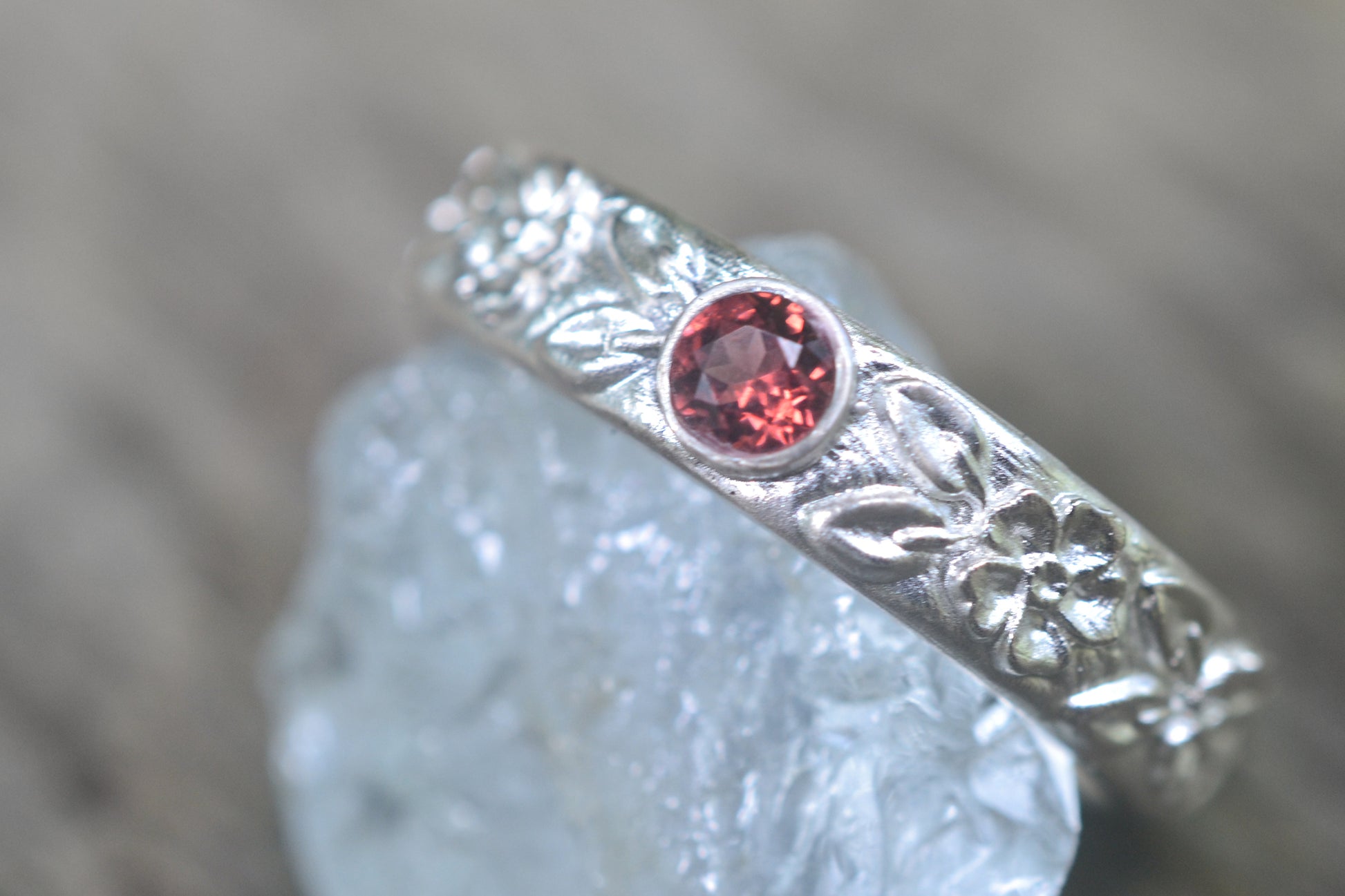 Recycled Silver Flower Wedding Band With Garnet
